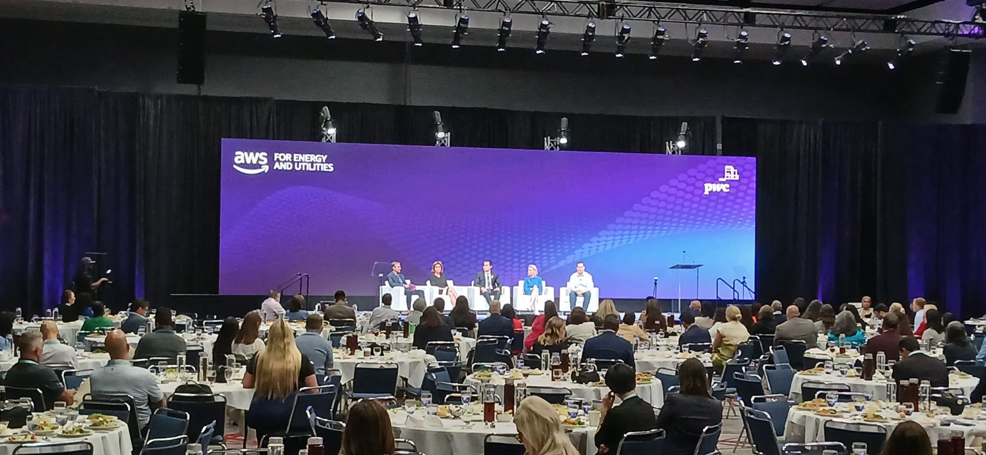 Corporate panel general session with a full-width LED wall over a ballroom luncheon, produced by NAVP